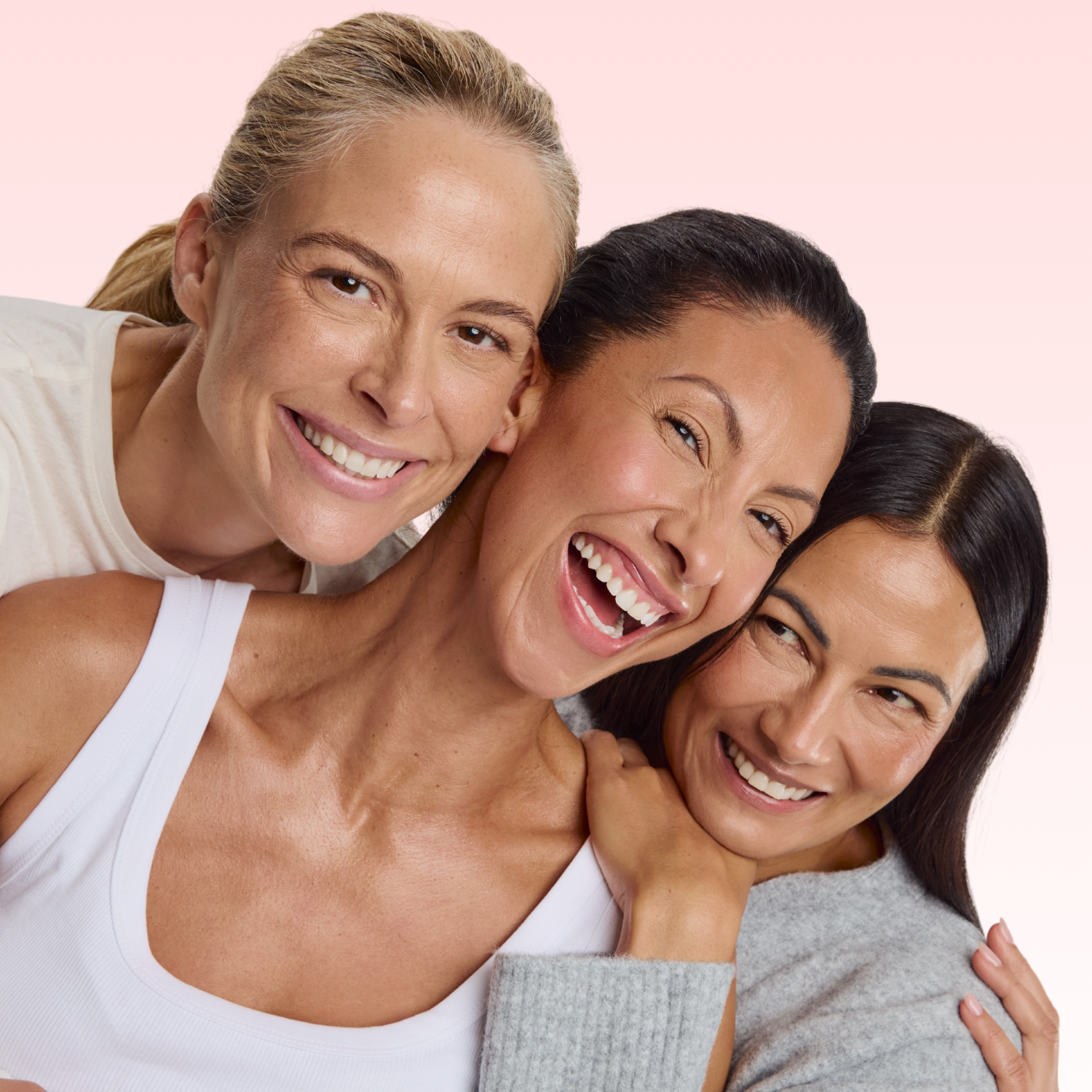 Three women with glowing skin
